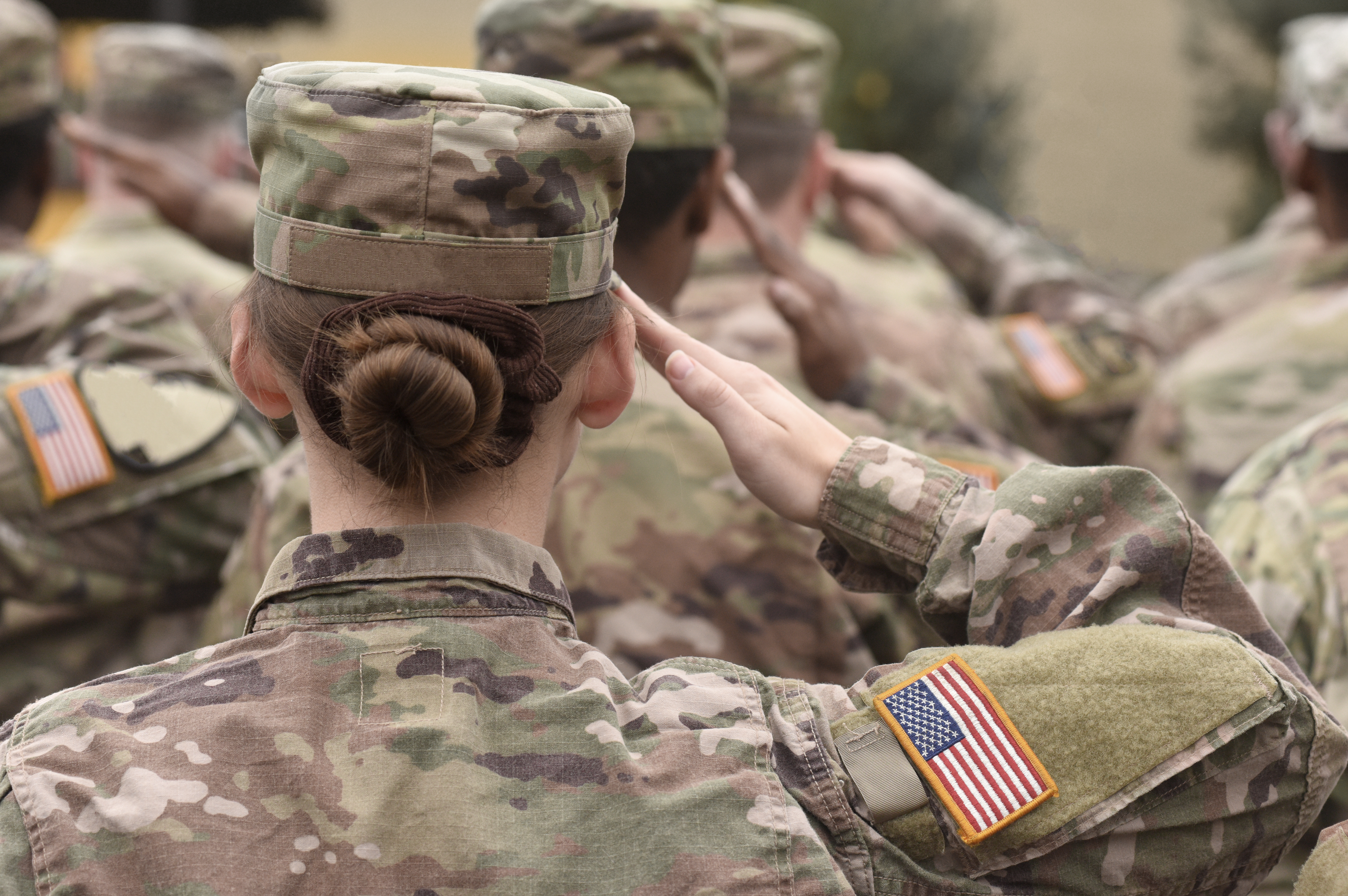 deployed us service members saluting